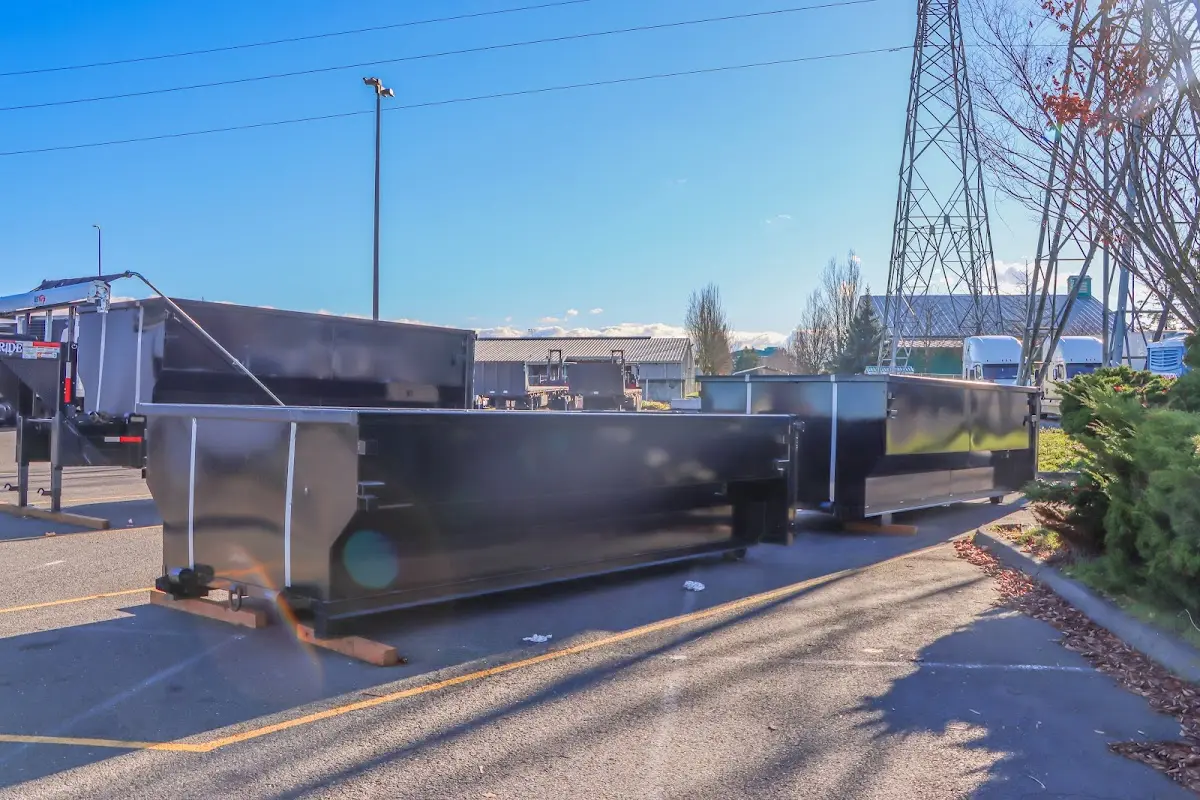 Roll-off dumpster ready for waste disposal at job site for 6 Yard Dumpster Rental in Fort Riley